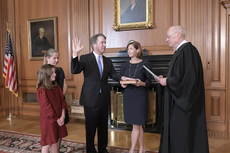 Brett Kavanaugh being sworn sworn in as the newest Supreme Court judge.