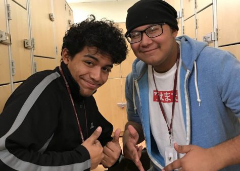 Alex Vega and Christian Bahena pose for quick photo before band rehearsal.