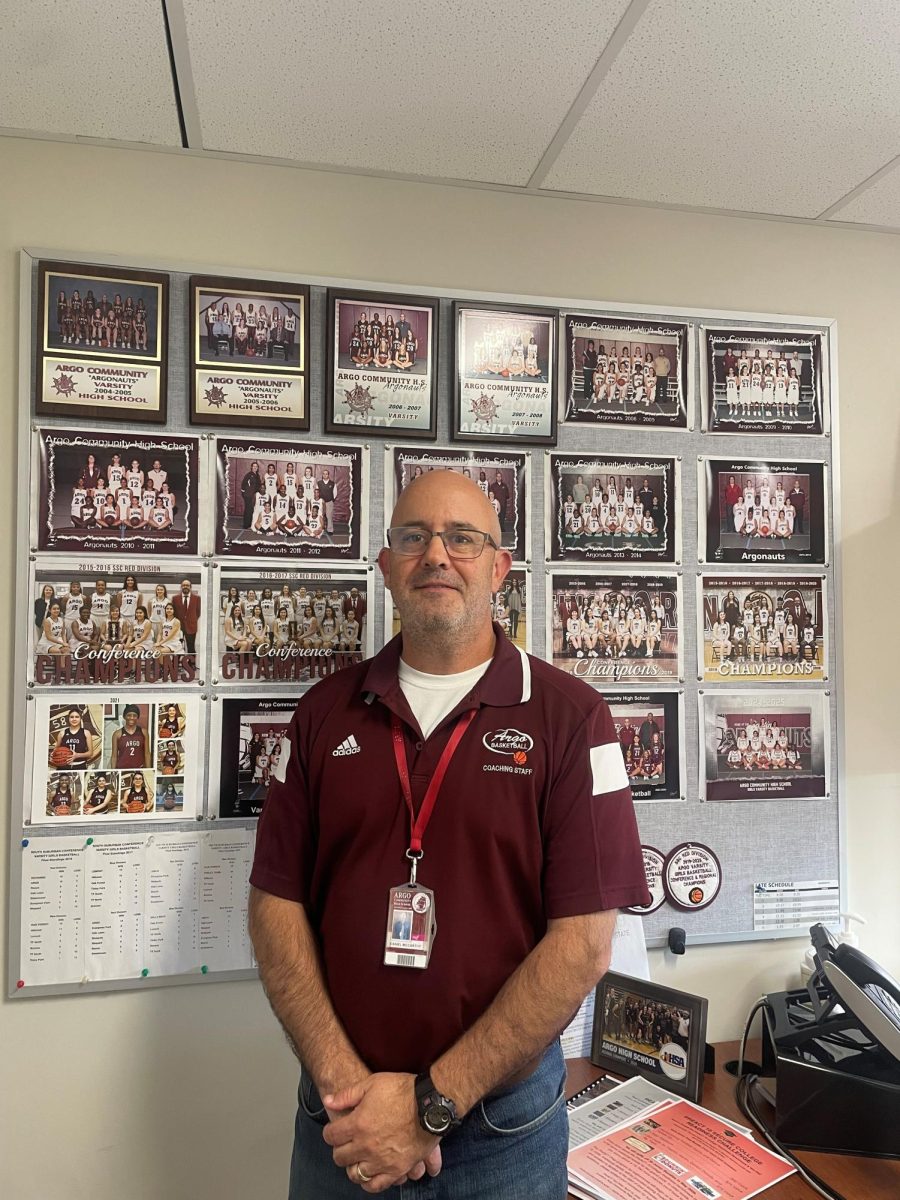 McCarthy, at his office, in front of pictures of his past teams. 

Photo taken by Kayla Gomez. 