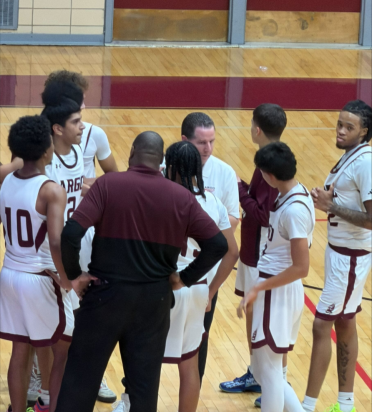 Maietta coaching his players at Alumni Night. Photo taken by Haytham R. Yusuf.